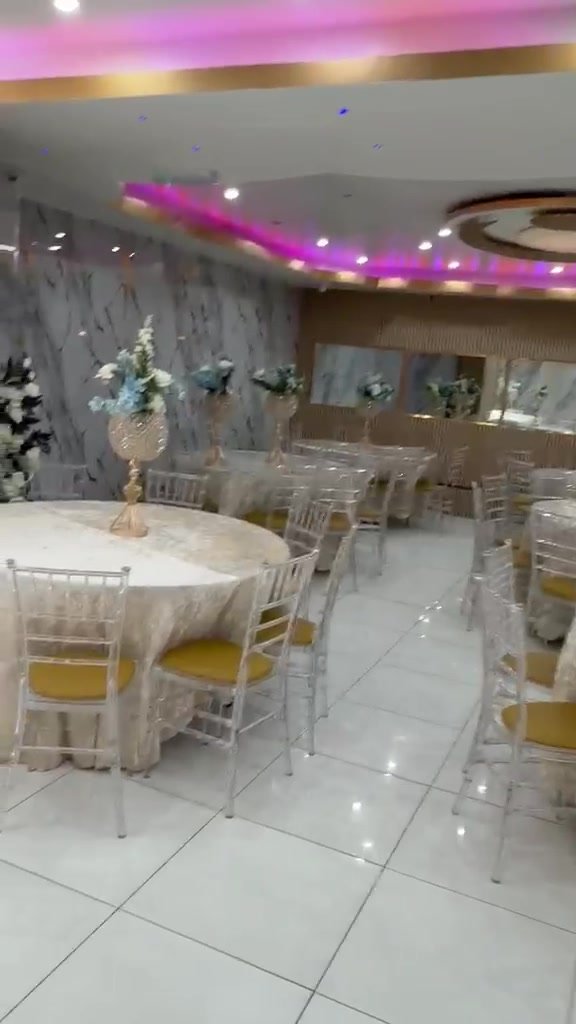 Round-table dining setup at Saba Banqueting Hall